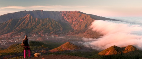 Hiker above La Palma's sea of clouds